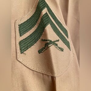 Khaki tan long, sleeved military uniform shirt. In good condition.
